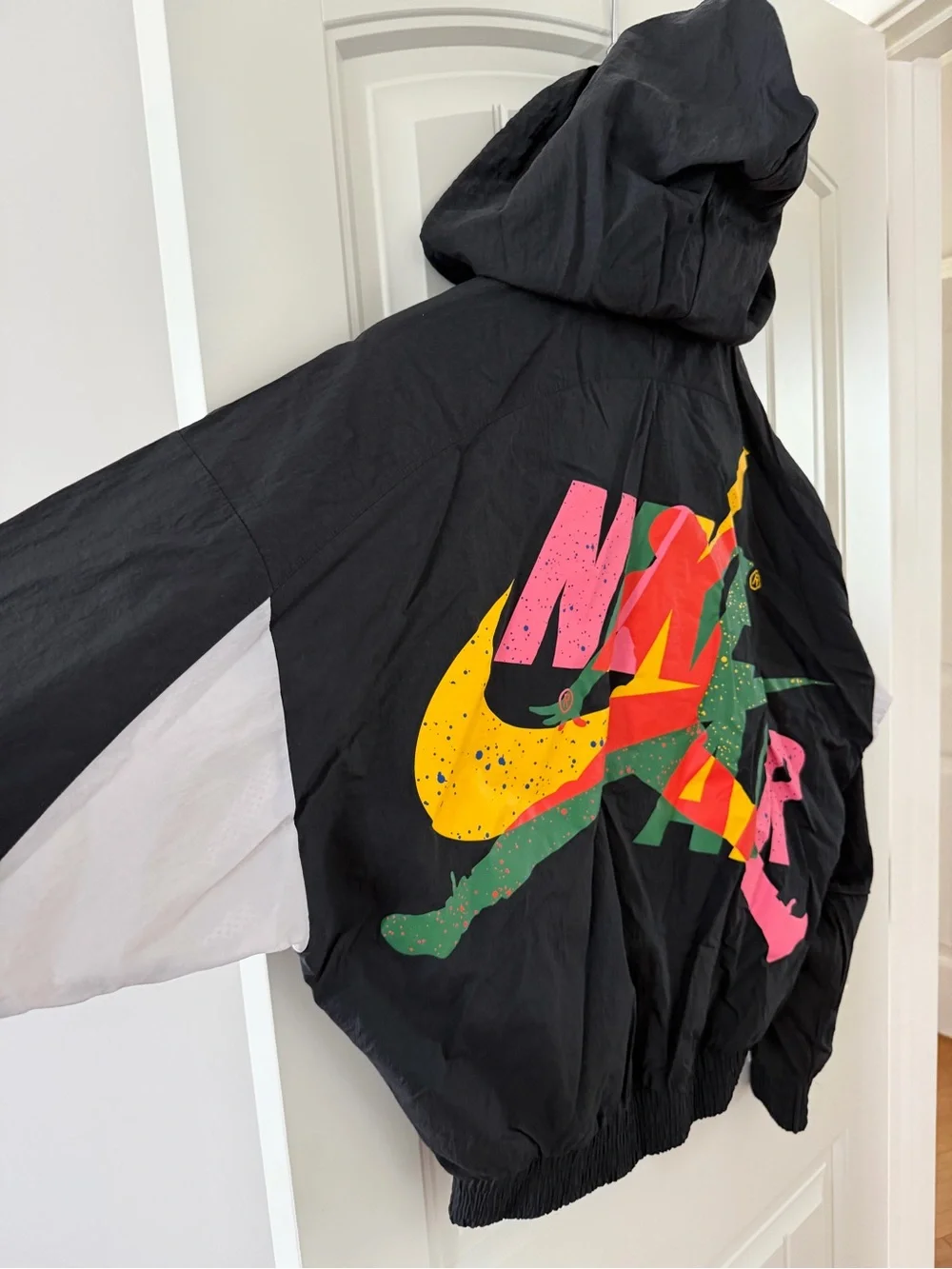 Jordan Black Hooded Windbreaker with Multicolor Logo Accent